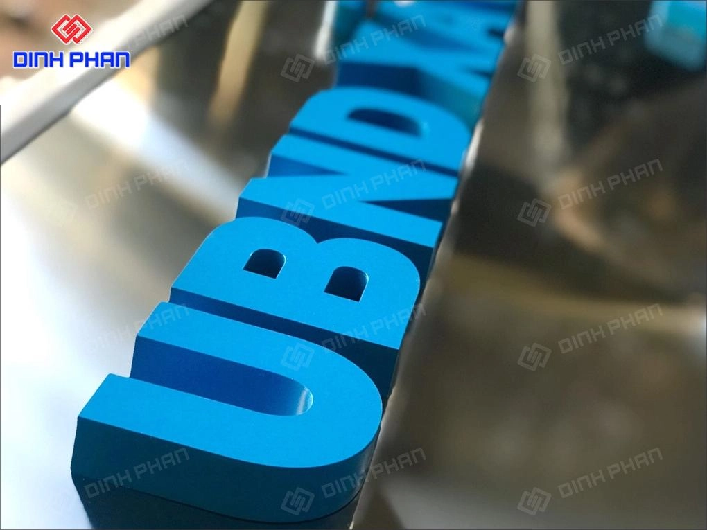 Gia công chữ inox sơn hấp nhiệt BMT