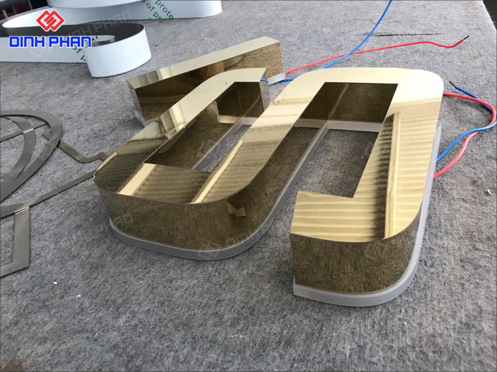 Làm chữ inox vàng gương BMT theo yêu cầu, giá rẻ Làm chữ inox vàng gương BMT