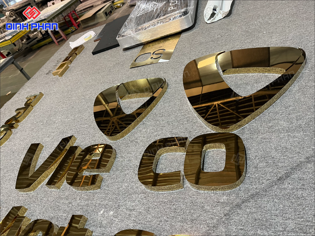 Làm chữ inox vàng gương BMT theo yêu cầu, giá rẻ Làm chữ inox vàng gương BMT